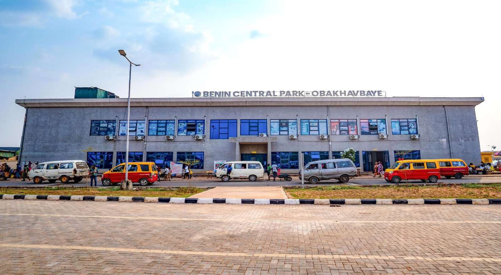 Front of the completed Benin Central Park terminal in Obakhavbaye with buses at the bays