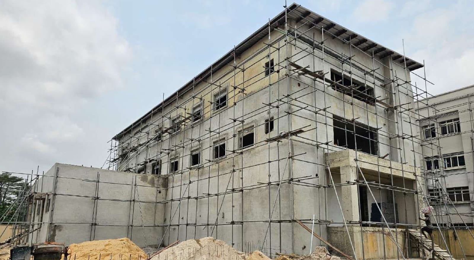 Scaffolded multi-storey Fidelity Bank building frame in Port Harcourt