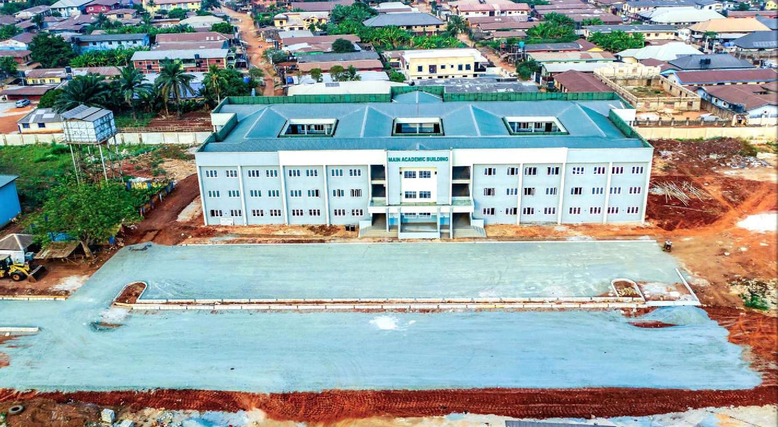 Aerial view of the new academic building and paved court at the School of Health Technology