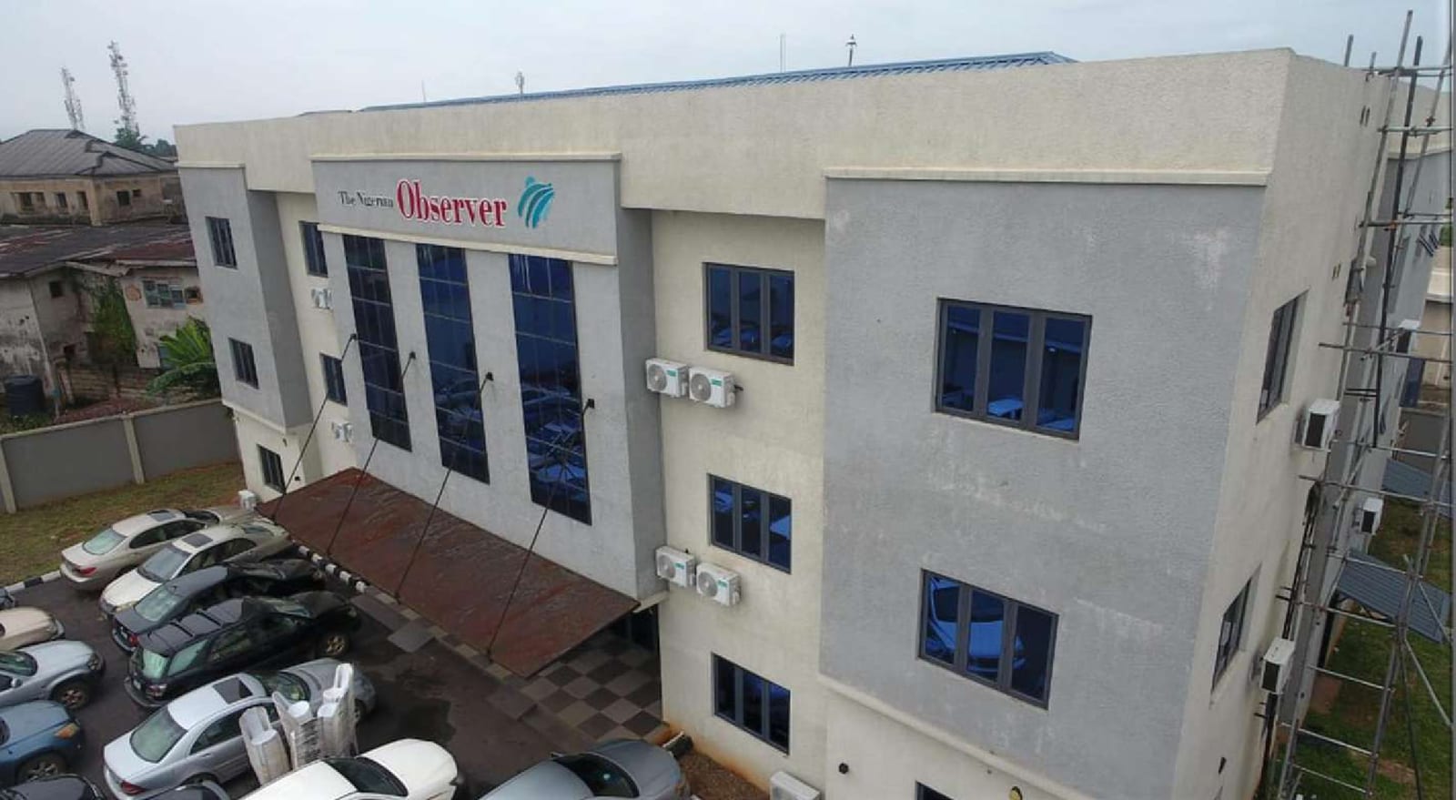 Corner view of the Nigerian Observer administrative building and signage